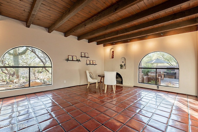 4401 E Havasu Rd, Tucson, AZ 85718 - interior space featuring dark tile patterned floors, wood ceiling, and beamed ceiling