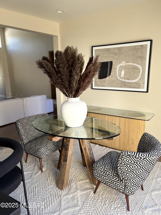 dining room featuring recessed lighting