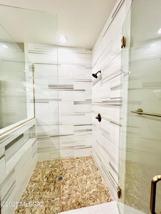 bathroom featuring tile patterned flooring, recessed lighting, and a stall shower