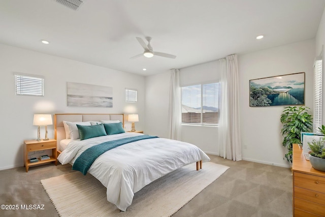 bedroom with a ceiling fan, visible vents, recessed lighting, light carpet, and baseboards