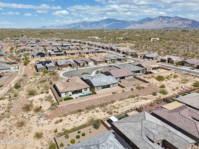 birds eye view of property featuring a mountain view and a residential view