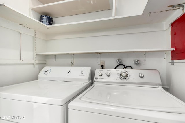 laundry area with washing machine and dryer and laundry area