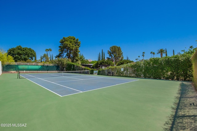 view of sport court featuring community basketball court and fence