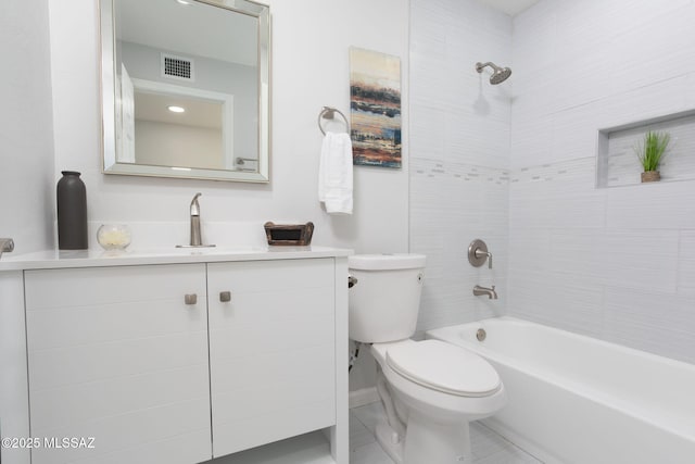 bathroom with visible vents, vanity, toilet, shower / tub combination, and tile patterned floors