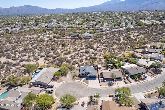 bird's eye view with a residential view and a mountain view