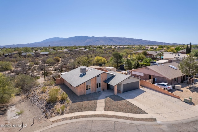 bird's eye view featuring a residential view and a mountain view
