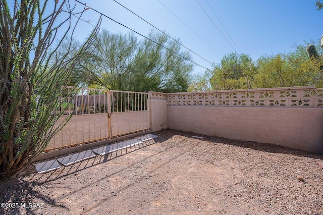 1402 N Camino Miraflores, Tucson, AZ 85745 - view of patio with a gate