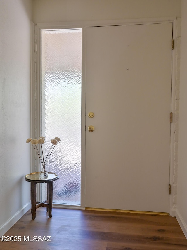 1402 N Camino Miraflores, Tucson, AZ 85745 - entryway with wood finished floors and baseboards