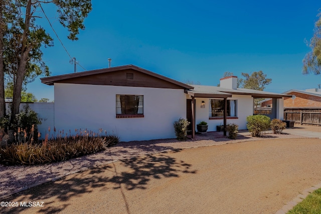 3315 N Tucson Blvd, Tucson, AZ 85716 - ranch-style house featuring stucco siding and a chimney