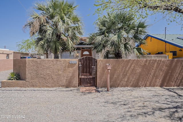2320 N Camilla Blvd, Tucson, AZ 85716 - gate featuring a fenced front yard