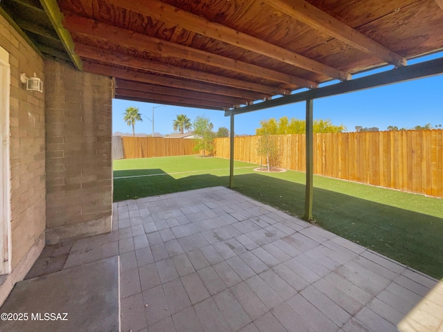 view of patio featuring a fenced backyard