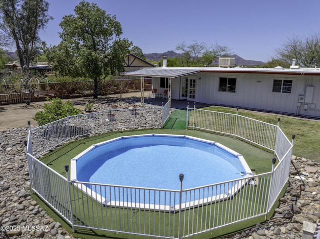 3061 W Avenida Cresta, Tucson, AZ 85745 - view of swimming pool featuring a patio area, central AC unit, and a mountain view