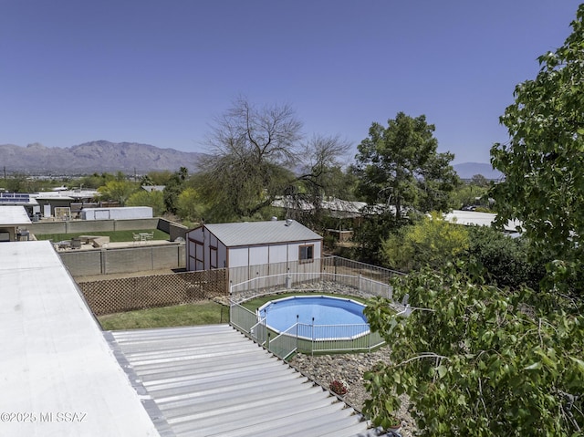 3061 W Avenida Cresta, Tucson, AZ 85745 - view of swimming pool with a fenced backyard and a mountain view