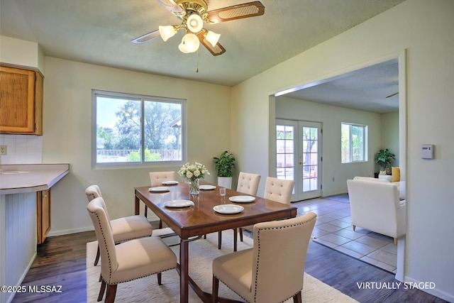 3061 W Avenida Cresta, Tucson, AZ 85745 - dining area with french doors, ceiling fan, wood finished floors, and baseboards