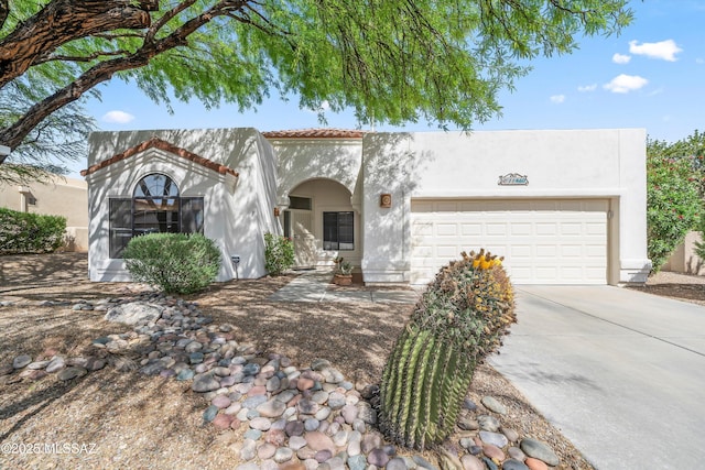 11460 N Palmetto Dunes Ave, Tucson, AZ 85737 - view of front of property with stucco siding, driveway, a tiled roof, and a garage