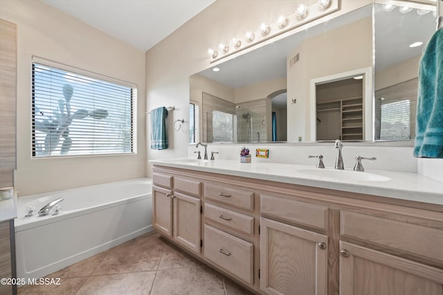 11460 N Palmetto Dunes Ave, Tucson, AZ 85737 - bathroom with visible vents, tile patterned floors, a stall shower, and a sink