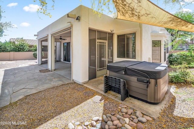 11460 N Palmetto Dunes Ave, Tucson, AZ 85737 - view of patio with a hot tub and fence