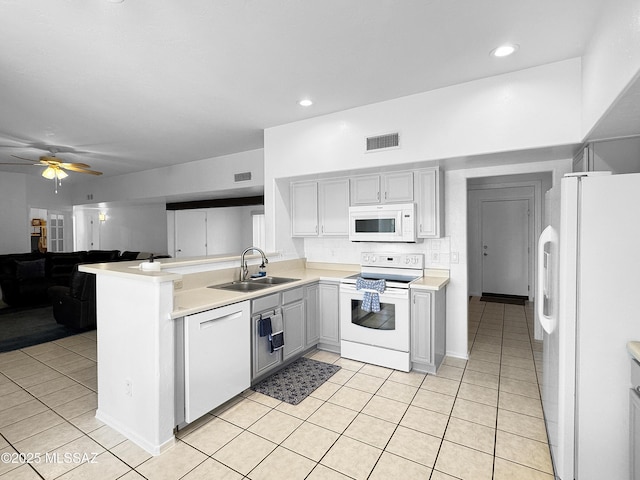 3021 E Dellwood Pl, Vail, AZ 85641 - kitchen featuring white appliances, light tile patterned floors, visible vents, and a sink