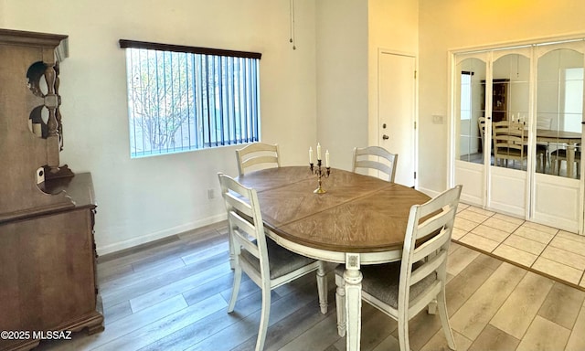 3021 E Dellwood Pl, Vail, AZ 85641 - dining space with light wood-type flooring and baseboards