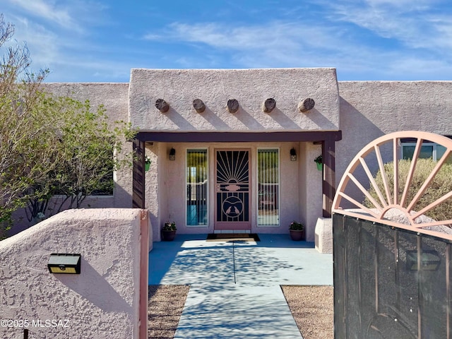 3021 E Dellwood Pl, Vail, AZ 85641 - entrance to property with a patio area and stucco siding