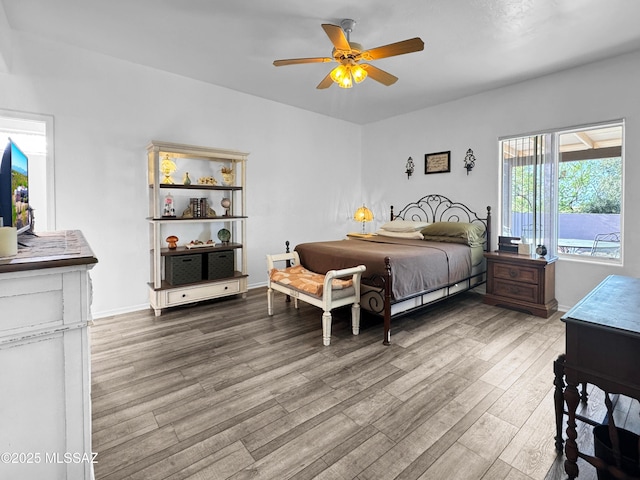 3021 E Dellwood Pl, Vail, AZ 85641 - bedroom featuring baseboards, ceiling fan, and wood finished floors