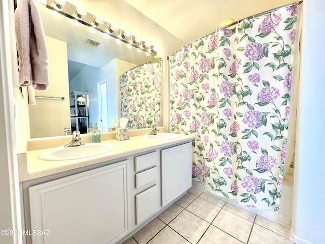 3021 E Dellwood Pl, Vail, AZ 85641 - full bath featuring double vanity, tile patterned floors, visible vents, and a sink