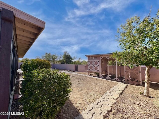 3021 E Dellwood Pl, Vail, AZ 85641 - view of yard with a fenced backyard and an outbuilding