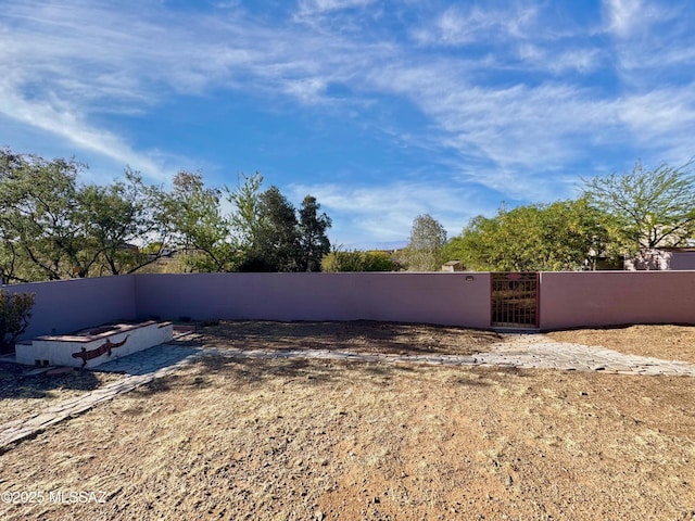 3021 E Dellwood Pl, Vail, AZ 85641 - view of yard featuring fence and a gate