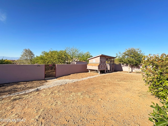 3021 E Dellwood Pl, Vail, AZ 85641 - view of yard featuring a gate and fence private yard