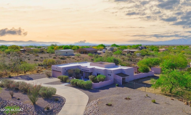 3021 E Dellwood Pl, Vail, AZ 85641 - aerial view at dusk featuring a mountain view