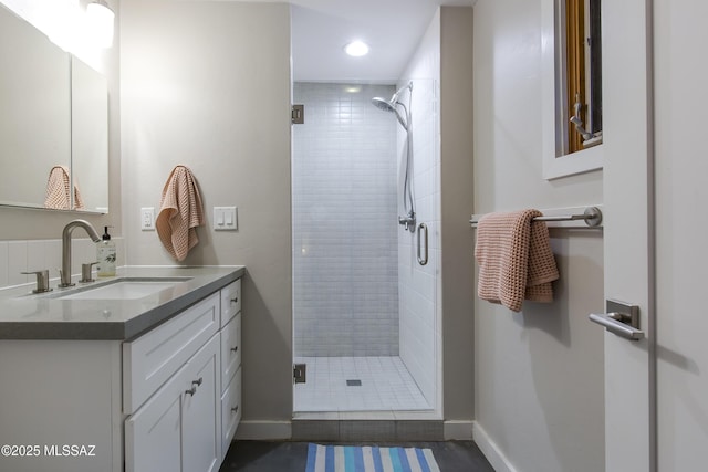 1321 N Norris Ave, Tucson, AZ 85719 - bathroom featuring a stall shower, vanity, recessed lighting, and baseboards