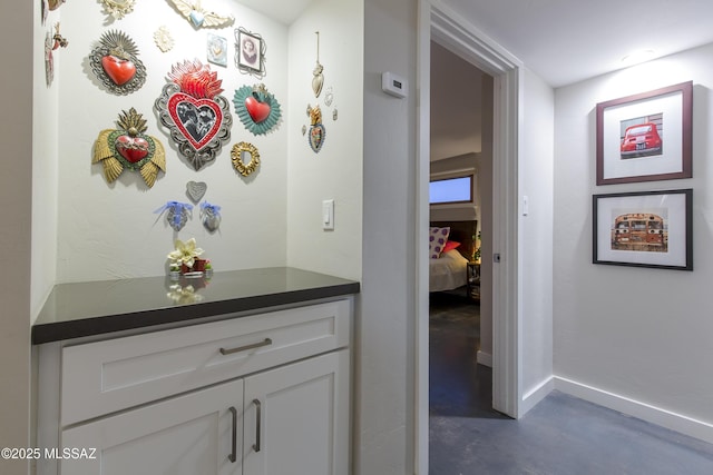 1321 N Norris Ave, Tucson, AZ 85719 - hall with concrete floors and baseboards