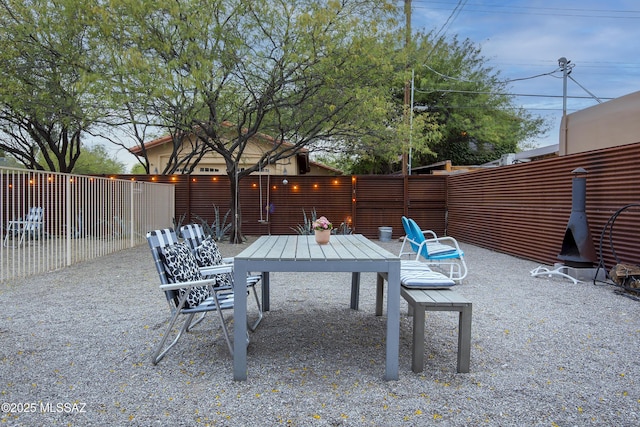 1321 N Norris Ave, Tucson, AZ 85719 - fenced backyard with outdoor dining space and a patio