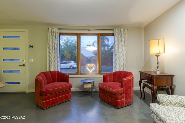 1321 N Norris Ave, Tucson, AZ 85719 - living area featuring finished concrete floors and baseboards