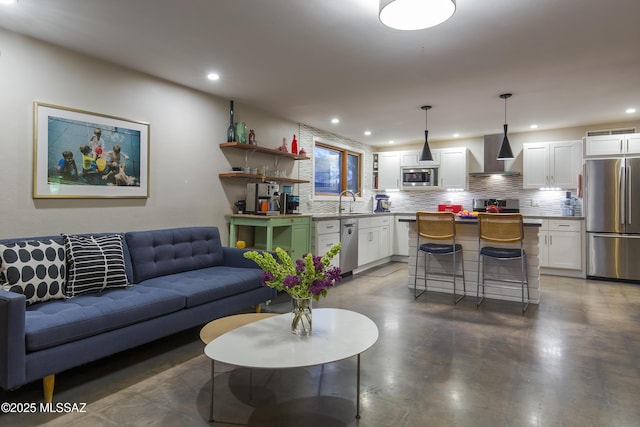 1321 N Norris Ave, Tucson, AZ 85719 - living area with finished concrete flooring and recessed lighting