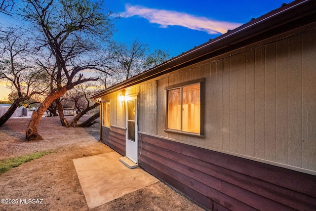822 E Pomerene Rd, Benson, AZ 85602 - property exterior at dusk with a patio area