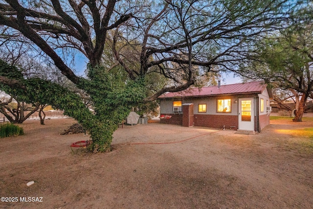 822 E Pomerene Rd, Benson, AZ 85602 - view of front of property with metal roof and brick siding