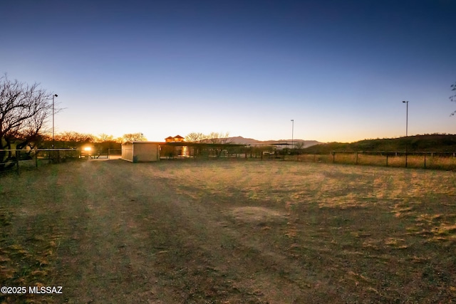 822 E Pomerene Rd, Benson, AZ 85602 - view of yard with fence and a view of countryside