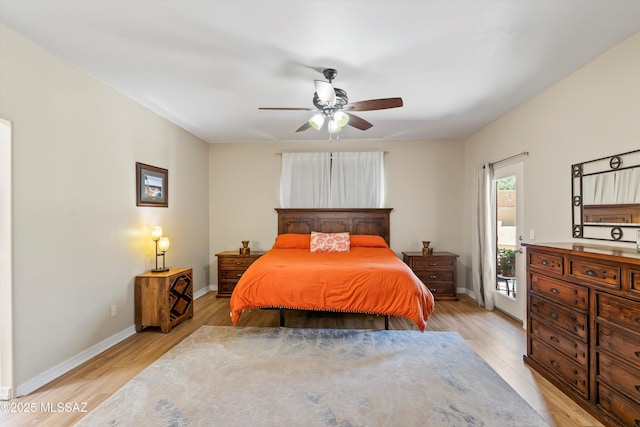bedroom with access to outside, light wood-style flooring, baseboards, and a ceiling fan