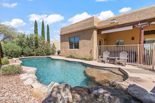pool featuring a patio