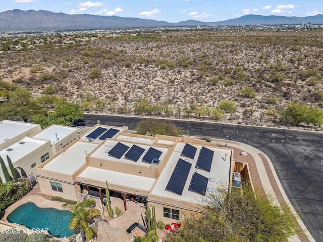 bird's eye view with a mountain view and view of desert
