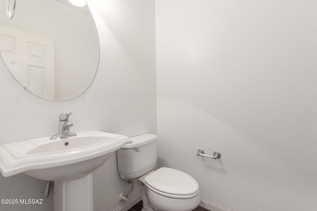 20950 E Frontier Rd, Red Rock, AZ 85145 - bathroom featuring toilet and baseboards