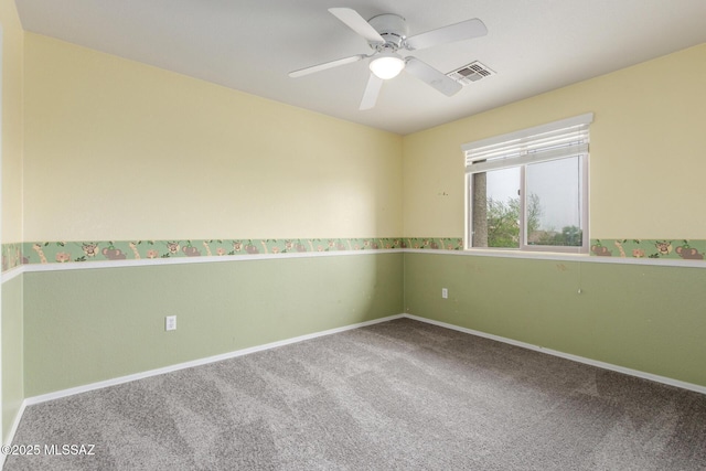 20950 E Frontier Rd, Red Rock, AZ 85145 - carpeted empty room with ceiling fan and baseboards