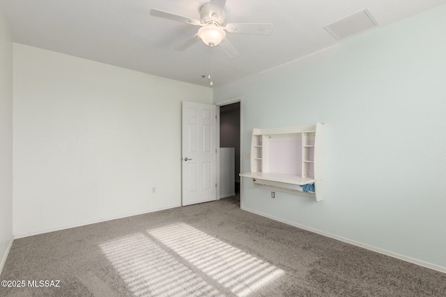 20950 E Frontier Rd, Red Rock, AZ 85145 - empty room with carpet flooring, ceiling fan, and baseboards
