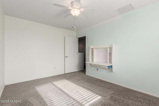 20950 E Frontier Rd, Red Rock, AZ 85145 - unfurnished room featuring carpet floors and a ceiling fan