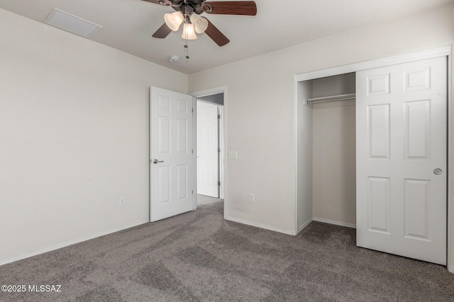20950 E Frontier Rd, Red Rock, AZ 85145 - unfurnished bedroom with carpet, a closet, ceiling fan, and baseboards