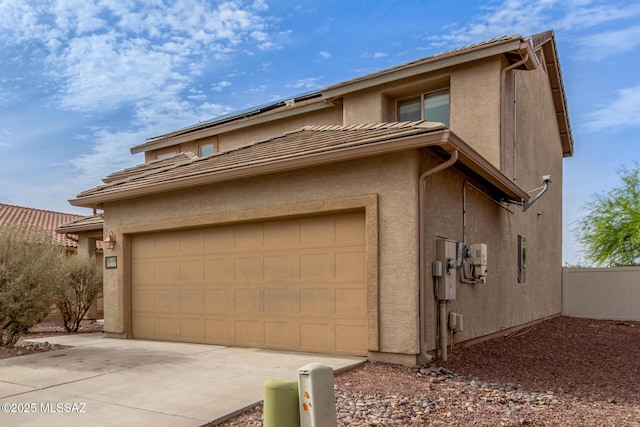 20950 E Frontier Rd, Red Rock, AZ 85145 - view of home's exterior featuring stucco siding, driveway, and a tile roof
