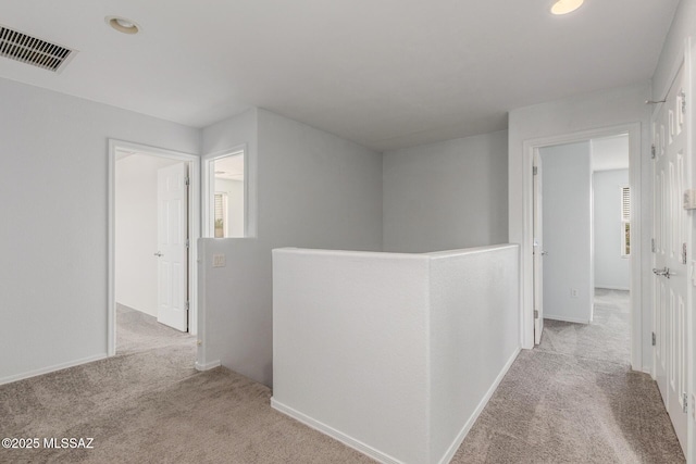 20950 E Frontier Rd, Red Rock, AZ 85145 - corridor with carpet flooring, an upstairs landing, recessed lighting, and baseboards