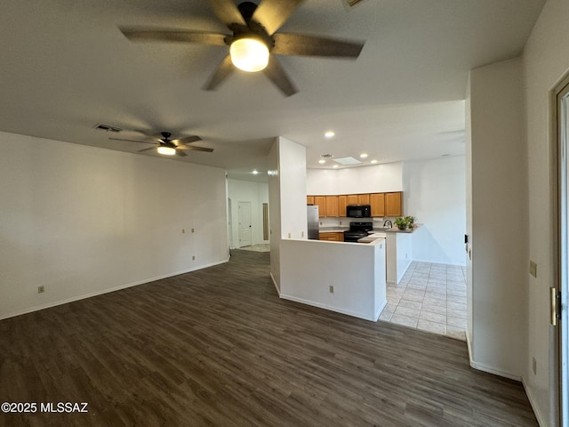 7456 E Placita Del Espiritu, Tucson, AZ 85715 - unfurnished living room featuring ceiling fan, wood finished floors, recessed lighting, and baseboards
