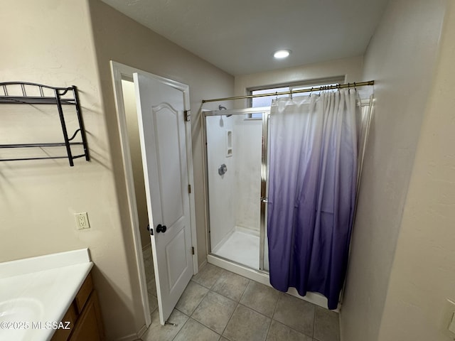 7456 E Placita Del Espiritu, Tucson, AZ 85715 - bathroom with a shower stall, vanity, and tile patterned flooring